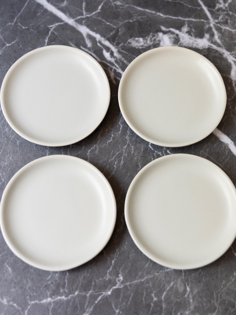 Set of 4 gray small ceramic plates Crate and Barrel made in Thailand 4.5 inches
